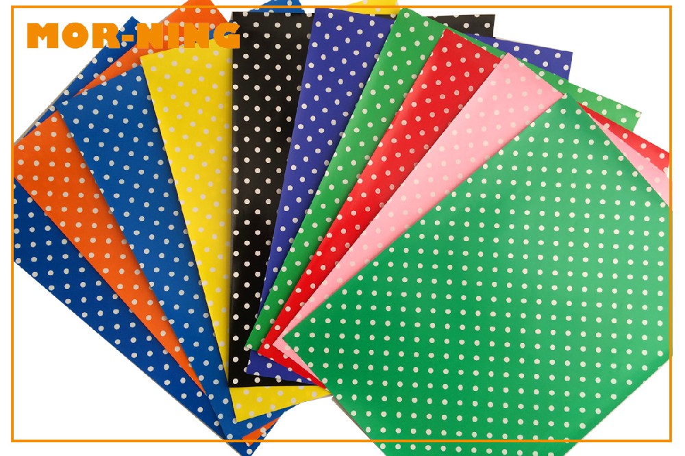 Glossy paper printed with dots